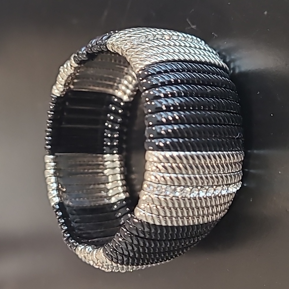 Black and Silver tone bracelet with rhinestones. 1" Wide.